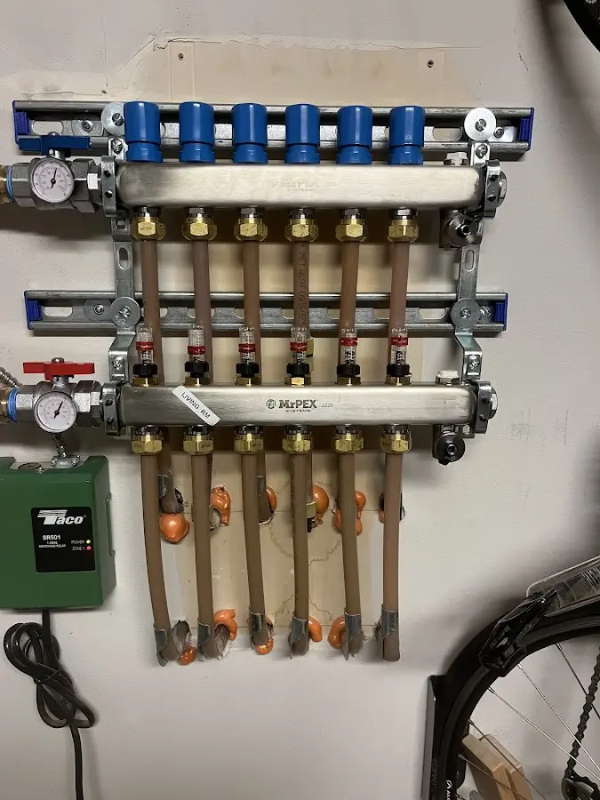 Plumber performing Water Heater Repair at a residential property in Granite Falls